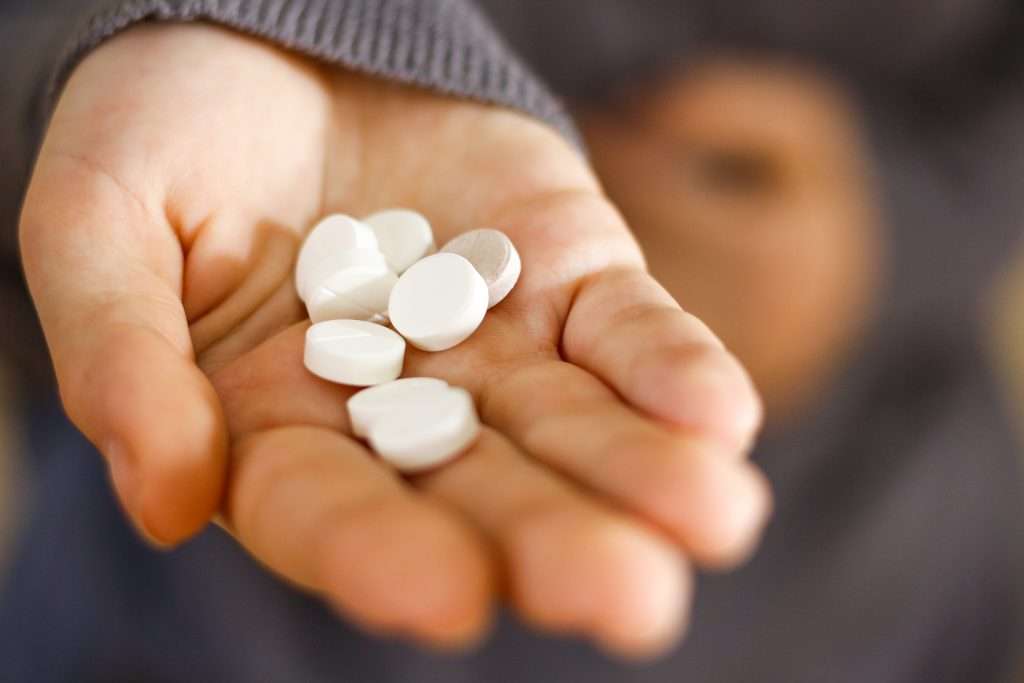 Handful of pharmaceutical pills